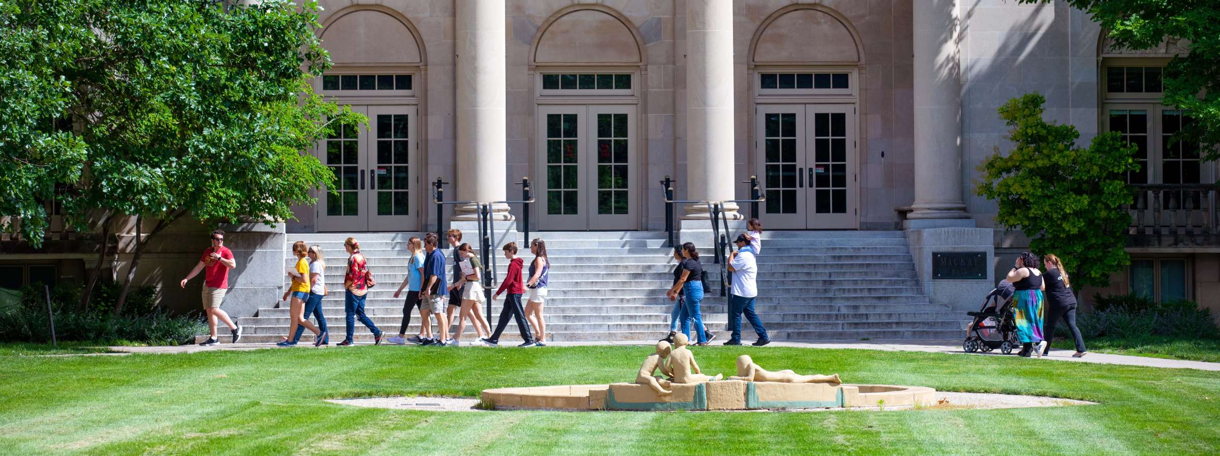 Families on a campus tour during orientation. 